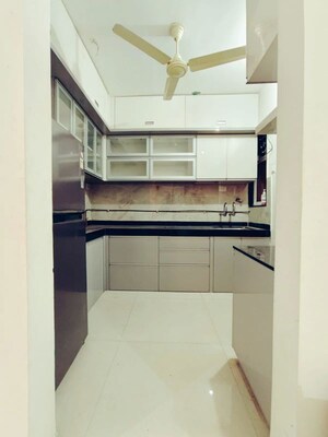 Kitchen in 2 BHK Apartment at Kohinoor Zen Estate, Kharadi – for Rent