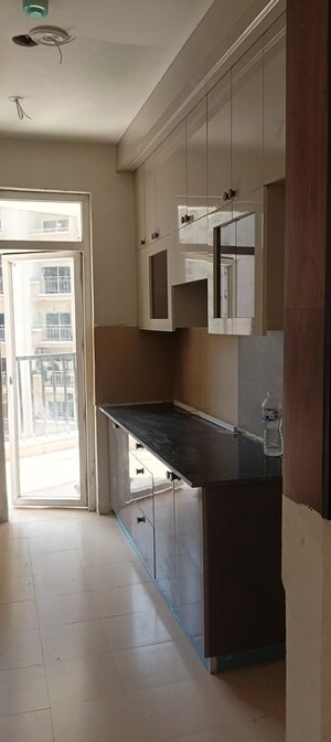 Kitchen in 2 BHK Apartment at Amrapali Zodiac, Sector 120 – for Sale