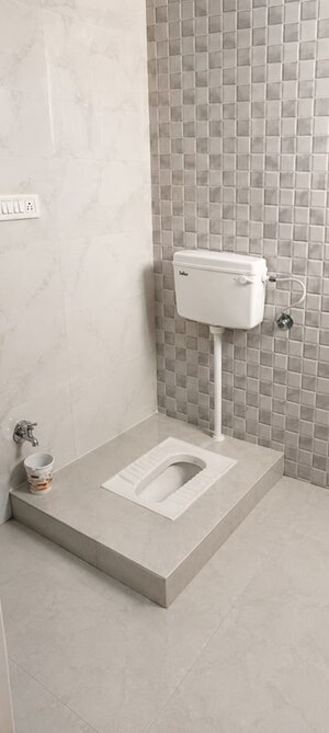 Bathroom in  Office Space at Ansal Sushant Golf city, Sushant Golf City – for Rent