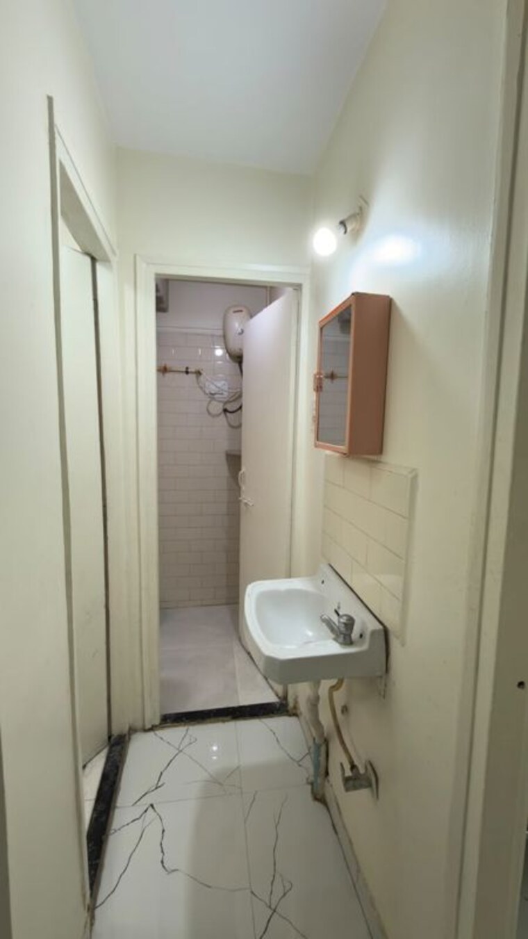 Bathroom, golf-residency-yerawada 1 Bedroom 650 Sq.Ft. Apartment In Yerawada Pune 10516949