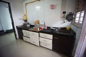 Kitchen in 2 BHK Apartment at Tragad – for Sale
