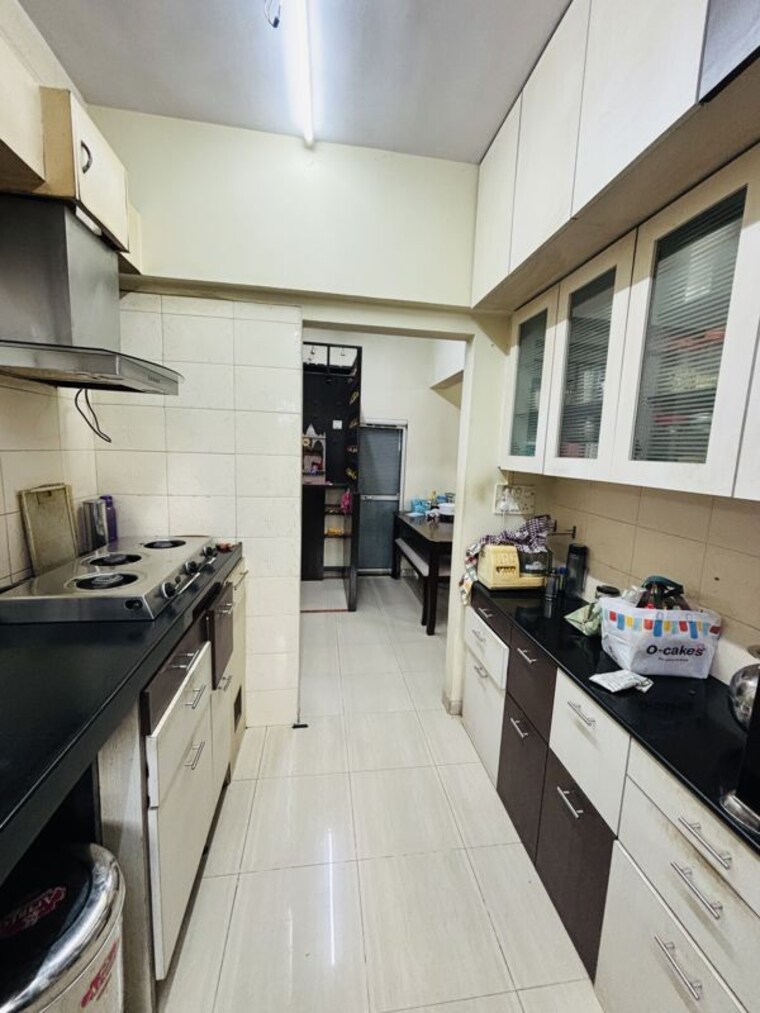 Kitchen, marathon-cosmos 2 Bedroom 890 Sq.Ft. Apartment In Mulund West Mumbai 10517009