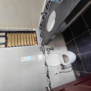 Bathroom in 2 BHK Apartment at K Raheja Heights, Malad East – for Rent