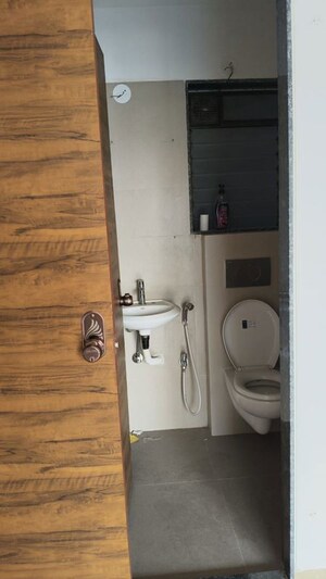 Bathroom in 1 BHK Apartment at Je And Vee Om Trimurti, Malad East – for Rent