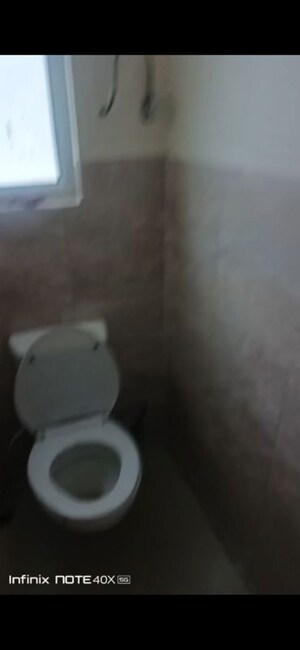 Bathroom in 1 BHK Apartment at Wave Dream Homes, Wave City – for Rent