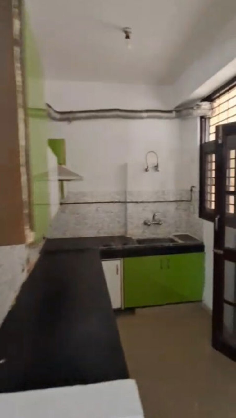 Kitchen, charms-castle 2 Bedroom 950 Sq.Ft. Apartment In Raj Nagar Extension Ghaziabad 10517135
