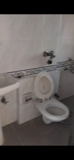 Bathroom in 3 BHK Apartment at K Raheja Palm Spring, Malad West – for Rent