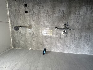 Bathroom in 1 BHK Apartment at Amrapali Dream Valley – for Rent
