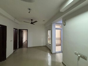 Living Room in 2 BHK Apartment at Ajnara Le Garden, Sector 16b Greater Noida – for Rent