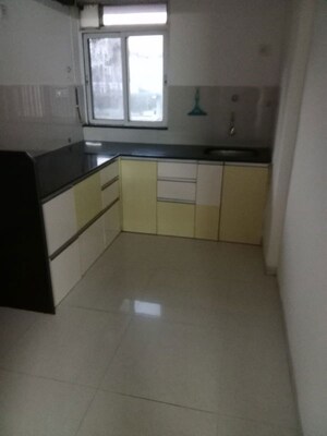 Kitchen in 2 BHK Apartment at Cosmos Park, Ghodbunder Road – for Rent