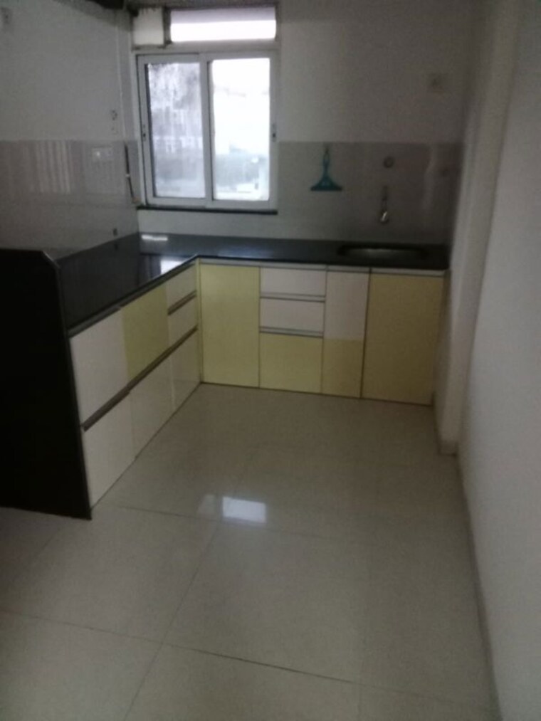 Kitchen, cosmos-park 2 Bedroom 600 Sq.Ft. Apartment In Ghodbunder Road Thane 10517356