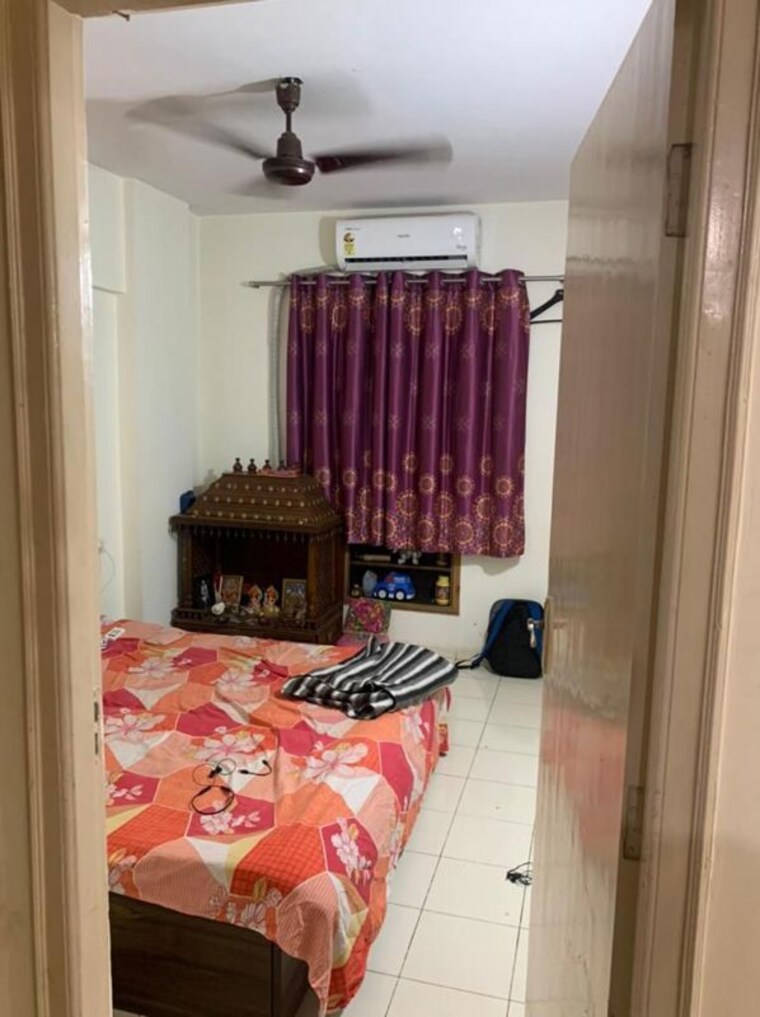 Bedroom, pratha-pushpa-society 2 Bedroom 600 Sq.Ft. Apartment In Ghodbunder Road Thane 10517398