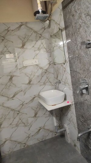 Bathroom in 2 BHK Apartment at Puraniks Kanchanpushp Complex, Kavesar – for Rent