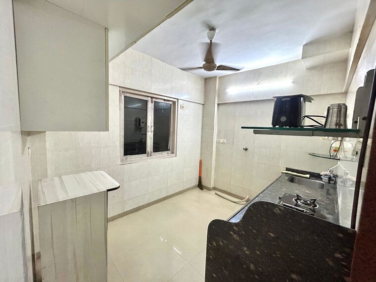 Kitchen, divine-aspen-garden 2 Bedroom 755 Sq.Ft. Apartment In Goregaon East Mumbai 10517410