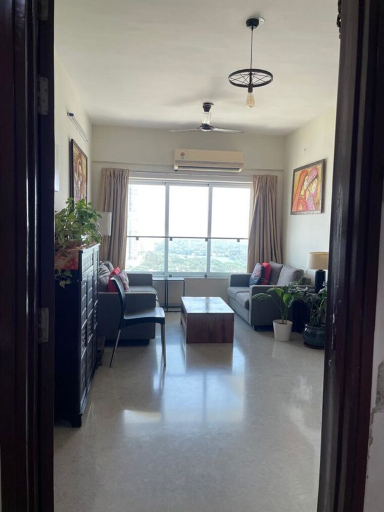 Living Room, romell-aether 2 Bedroom 750 Sq.Ft. Apartment In Goregaon East Mumbai 10517402