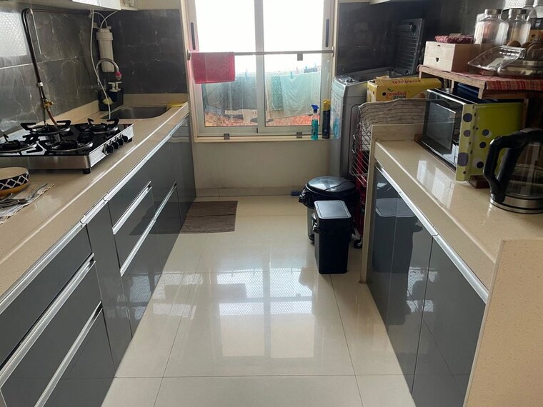 Kitchen, romell-aether 2 Bedroom 750 Sq.Ft. Apartment In Goregaon East Mumbai 10517402