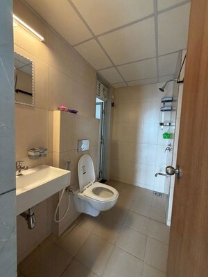 Bathroom in 3 BHK Apartment at Godrej Emerald, Ghodbunder Road – for Rent