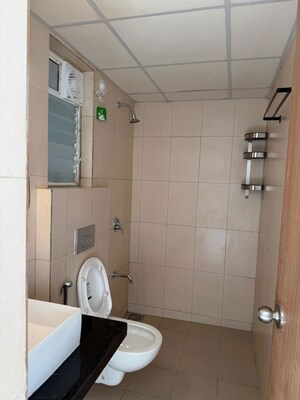Bathroom in 3 BHK Apartment at Godrej Emerald, Ghodbunder Road – for Rent