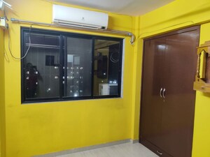 Room in 2 BHK Apartment at Unnati Woods CHS, Kasarvadavali – for Rent
