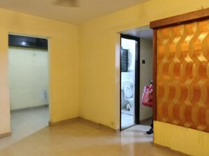 Room in 2 BHK Apartment at Unnati Woods CHS, Kasarvadavali – for Rent
