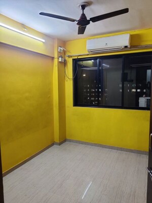 Bedroom in 2 BHK Apartment at Unnati Woods CHS, Kasarvadavali – for Rent