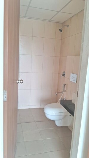 Bathroom in 2 BHK Apartment at Godrej Emerald, Ghodbunder Road – for Rent