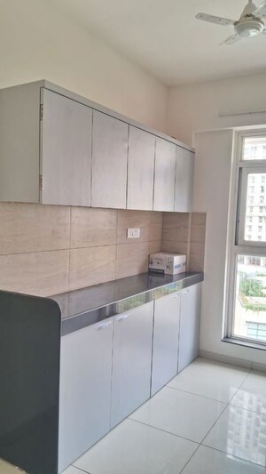 Kitchen in 2 BHK Apartment at Godrej Emerald, Ghodbunder Road – for Rent