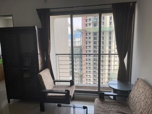 Living Room in 2 BHK Apartment at Runwal Eirene, Balkum Pada – for Rent