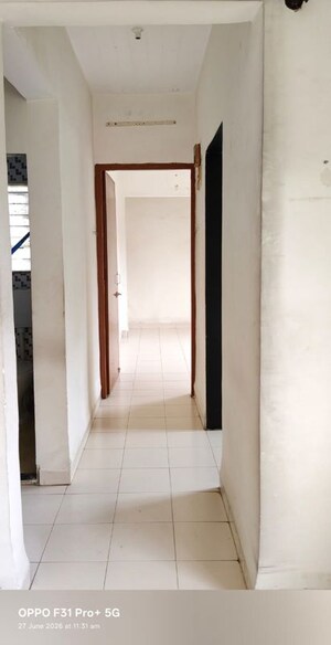 Building Lobby in 1 BHK Apartment at Vijay Annex 7, Waghbil – for Rent
