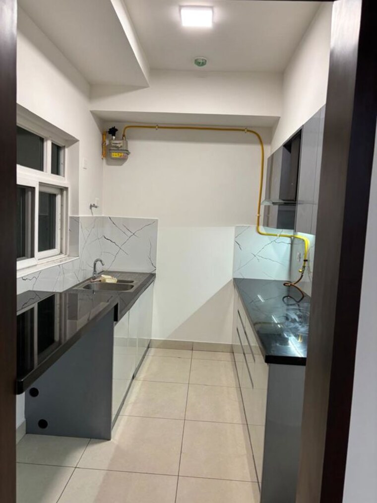 Kitchen, brigade-bricklane 1 Bedroom 600 Sq.Ft. Apartment In Jakkuru Bangalore 10517484