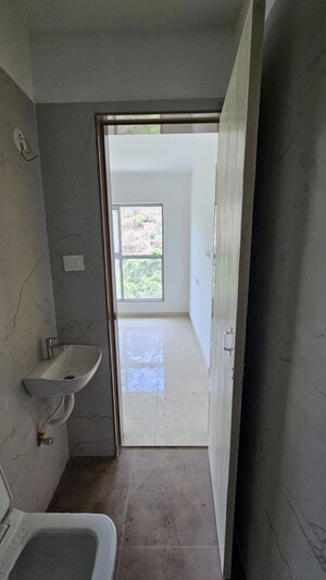 Bathroom in 1 BHK Apartment at Anant Metropolis Insignia Towers, Kasarvadavali – for Rent
