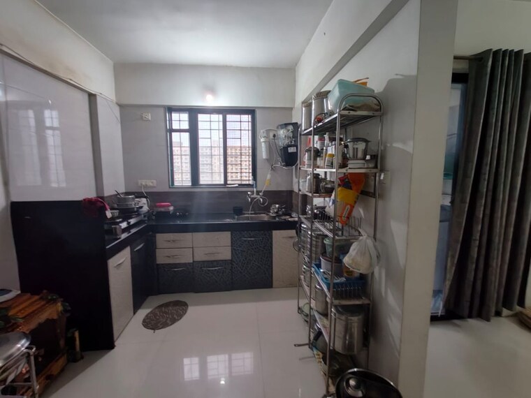 Kitchen, magarpatta-city-heliconia 1 Bedroom 650 Sq.Ft. Apartment In Hadapsar Pune 10517498