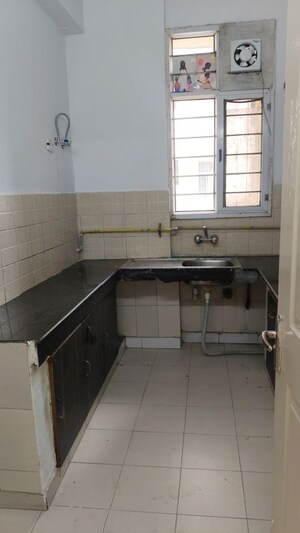 Kitchen in 3 BHK Apartment at Jaipuria Sunrise Greens, Ahinsa Khand 1 – for Sale