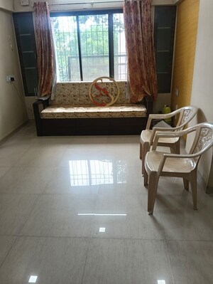 Living Room in 1 BHK Apartment at Shree Gayatri Ganesh Apartment, Borivali West – for Rent