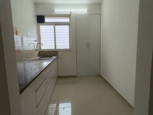 Kitchen in 2 BHK Apartment at Puranik City Reserva, Ghodbunder Road – for Rent