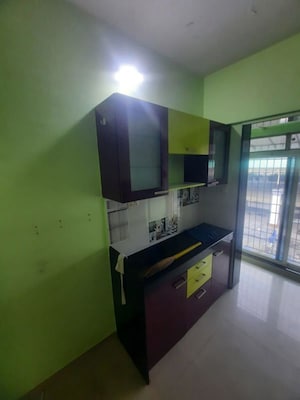 Kitchen in 2 BHK Apartment at Rustomjee Urbania Acura, Thane West – for Rent