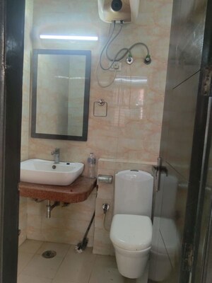 Bathroom in 3 BHK Builder Floor at Mehrauli – for Rent
