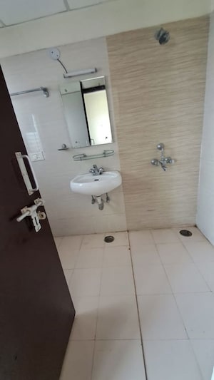 Bathroom in 3 BHK Apartment at Nandakini Alaknanda Estate, Amar Shaheed Path – for Rent