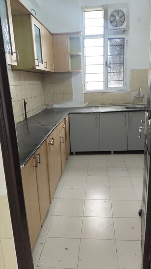 Kitchen in 2 BHK Apartment at Jaipuria Sunrise Greens, Ahinsa Khand 1 – for Sale