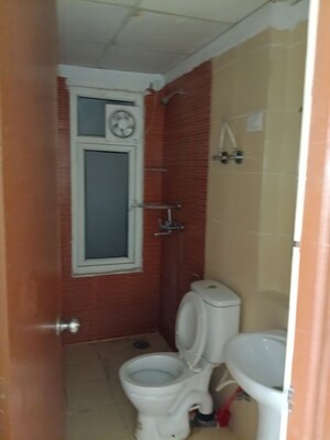 Bathroom in 3 BHK Apartment at Sector 16 Greater Noida – for Rent