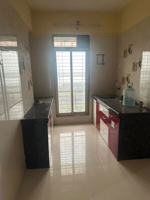 Kitchen in 2 BHK Apartment at Lodha Splendora Platino, Ghodbunder Road – for Rent