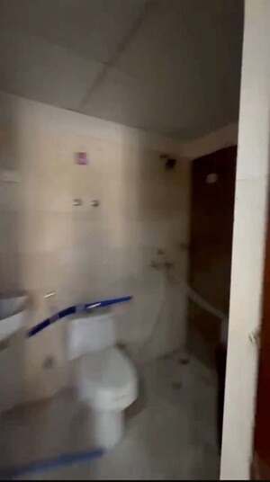 Bathroom in 2 BHK Apartment at Mittal Rajnagar Residency, Raj Nagar Extension – for Sale