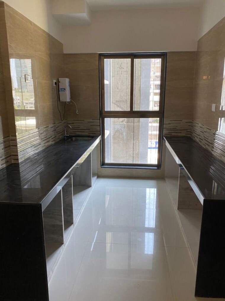 Kitchen, raj-infinia 3 Bedroom 1200 Sq.Ft. Apartment In Malad West Mumbai 10517775