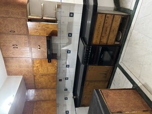 Kitchen in 3 BHK Apartment at RWA Jalvayu Vihar, Sector 25 – for Sale