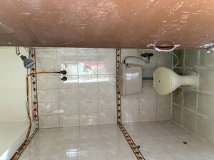 Bathroom in 2 BHK Apartment at RWA Jalvayu Vihar, Sector 25 – for Rent