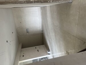 Bathroom in 3 BHK Apartment at Charms Castle, Raj Nagar Extension – for Sale