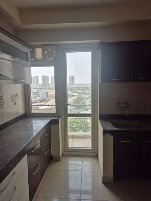 Kitchen in 2 BHK Apartment at Mahindra Aura, Sector 110a – for Sale