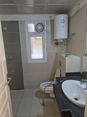 Bathroom in 2 BHK Apartment at Mahindra Aura, Sector 110a – for Sale