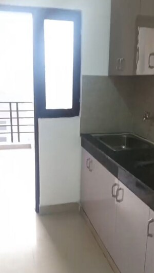 Kitchen in 2 BHK Apartment at Adore Samriddhi, Sector 89 – for Sale