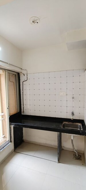 Kitchen in 1 RK Apartment at Seven Eleven Apna Ghar II, Mira Road – for Sale